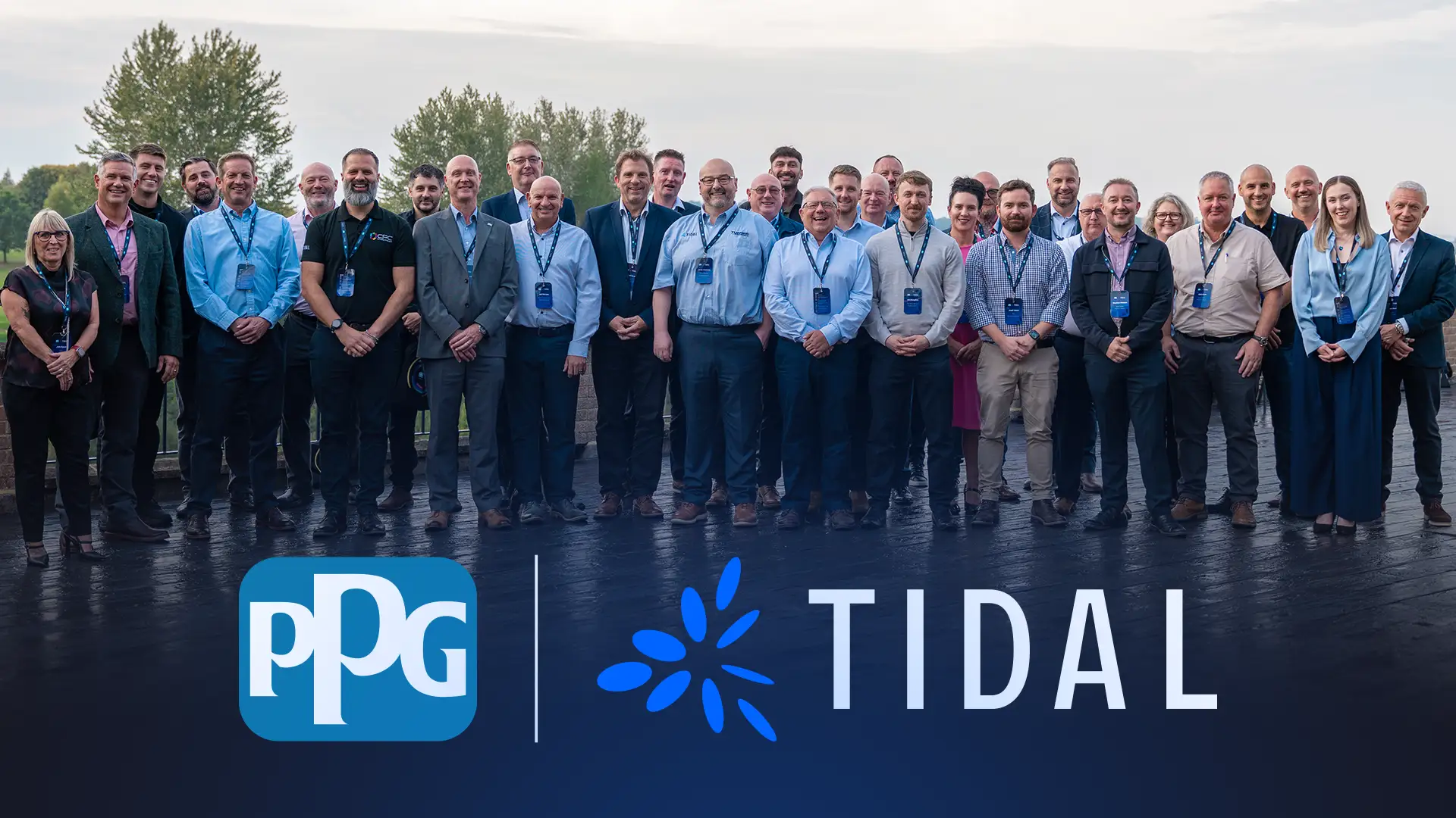 PPG and TIDAL teams standing shoulder to shoulder for a group photograph